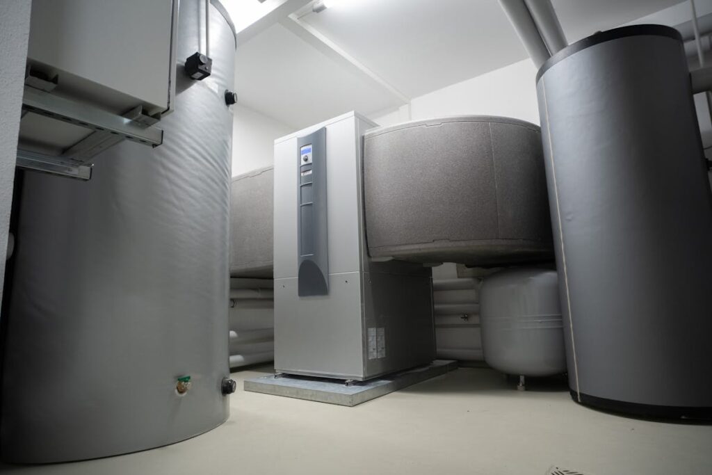 Air source heat pump on the side of a residential property