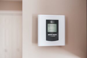 Smart thermostat controlling home heating